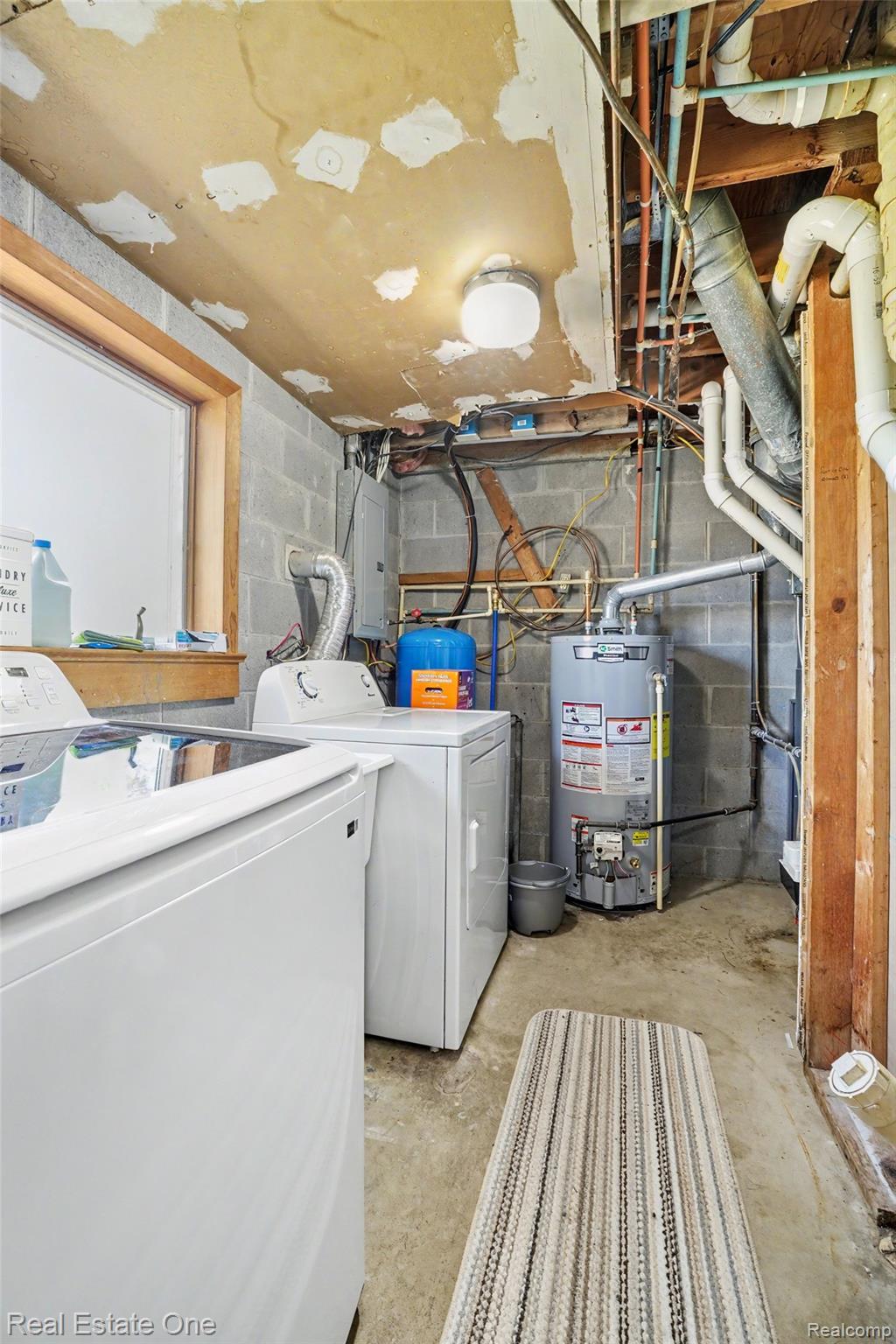 5191 Cottrell Road Vassar, MI 48768 - Photo 21 of 39 Laundry