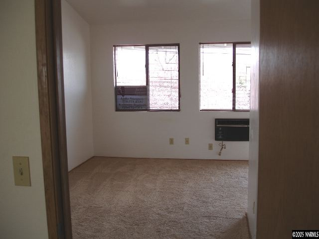 1215 Valley Road, Unit 8 Reno, NV 89512 - Photo 5 of 5 an empty room with a window