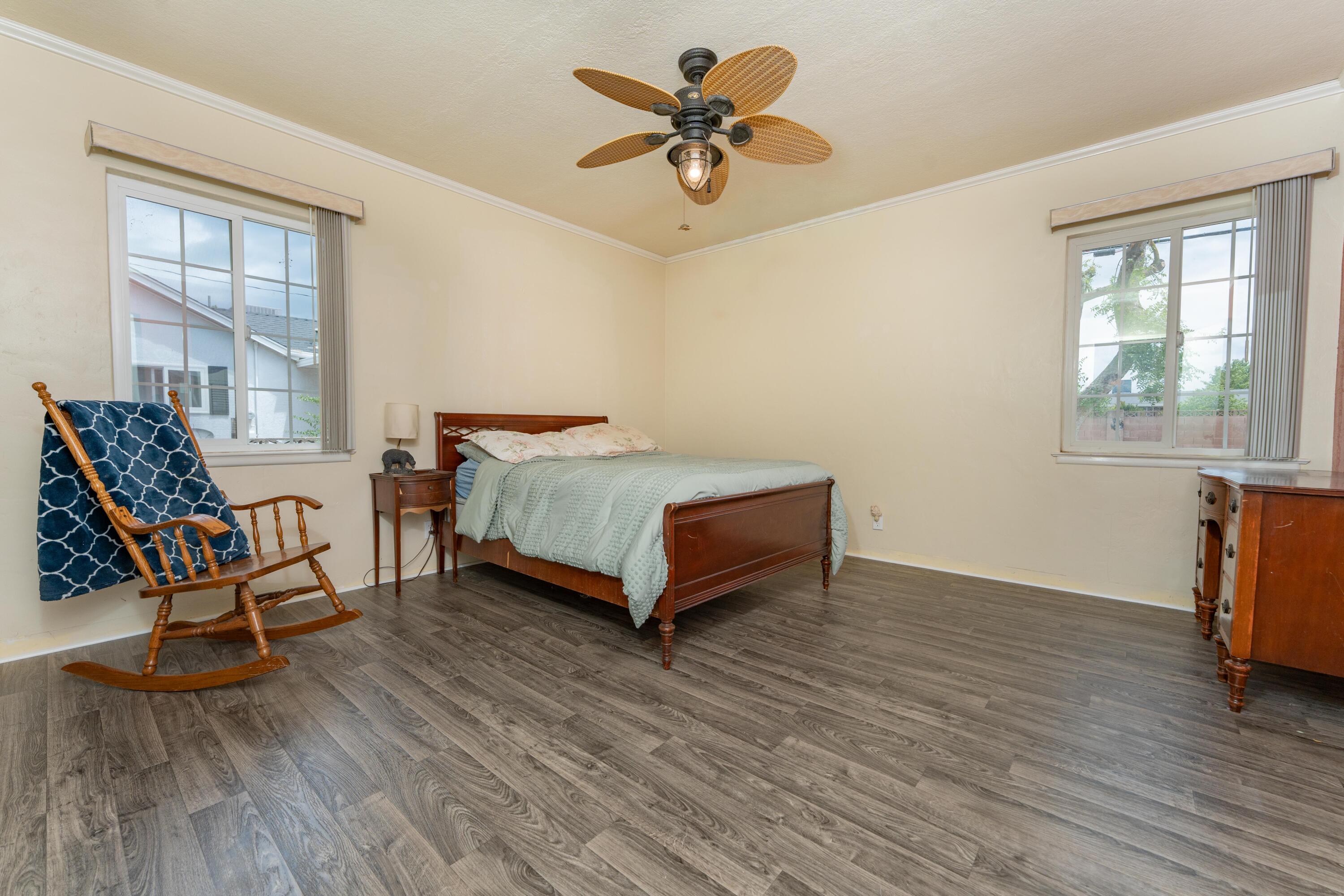 570 North Birch Avenue Reedley, CA 93654 - Photo 28 of 52 a bedroom with a bed and chair