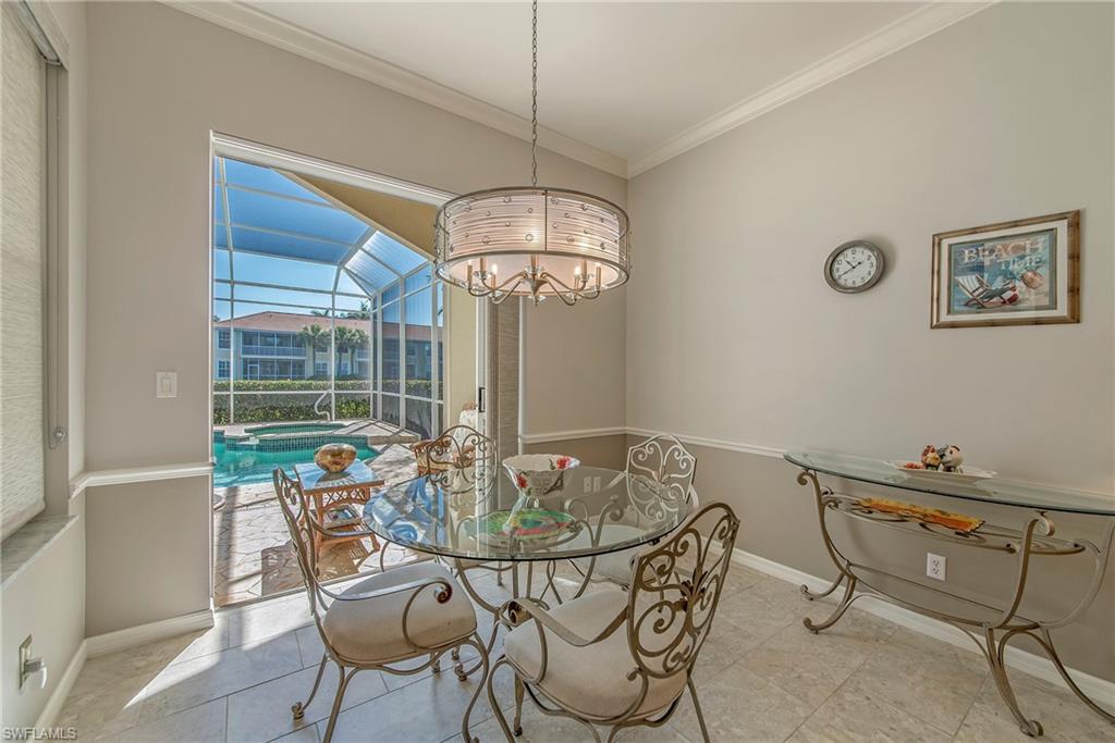 2004 Timarron Way Naples, FL 34109 - Photo 17 of 30 a dining room with furniture and window