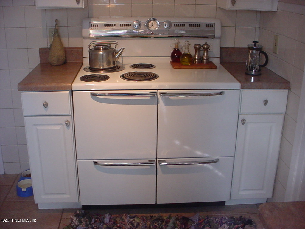 10454 Stone Road Jacksonville, FL 32246 - Photo 11 of 14 a close view of a stove top oven sitting inside of a kitchen