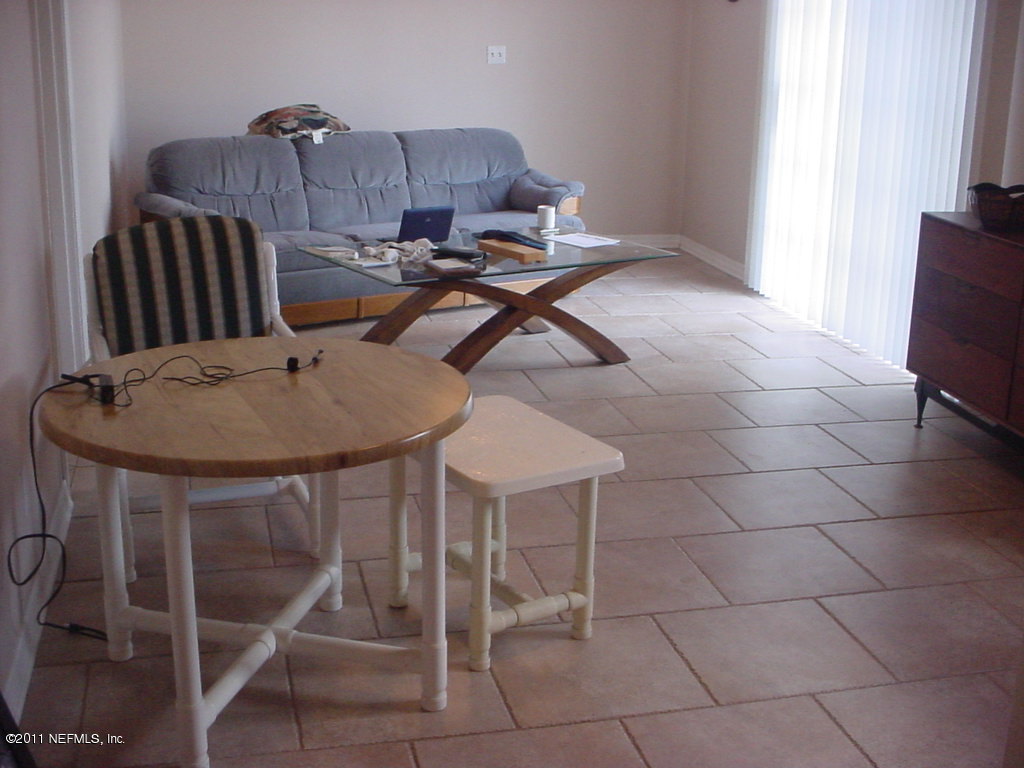 10454 Stone Road Jacksonville, FL 32246 - Photo 13 of 14 a table and chairs in a room