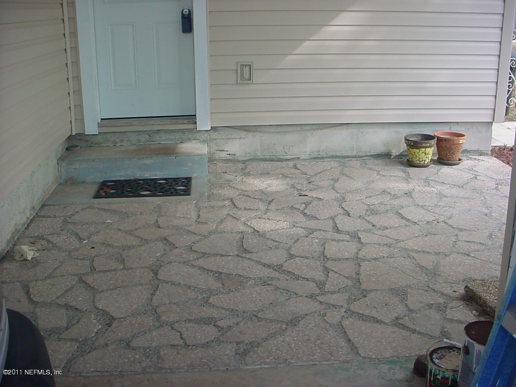 10454 Stone Road Jacksonville, FL 32246 - Photo 6 of 14 a view of a wooden door