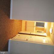 851 North Glebe Road, Unit 807 Arlington, VA 22203 - Photo 11 of 11 a bathroom with a bathtub and a next to a window