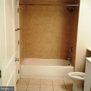 851 North Glebe Road, Unit 807 Arlington, VA 22203 - Photo 5 of 11 a bathroom with a shower and a toilet