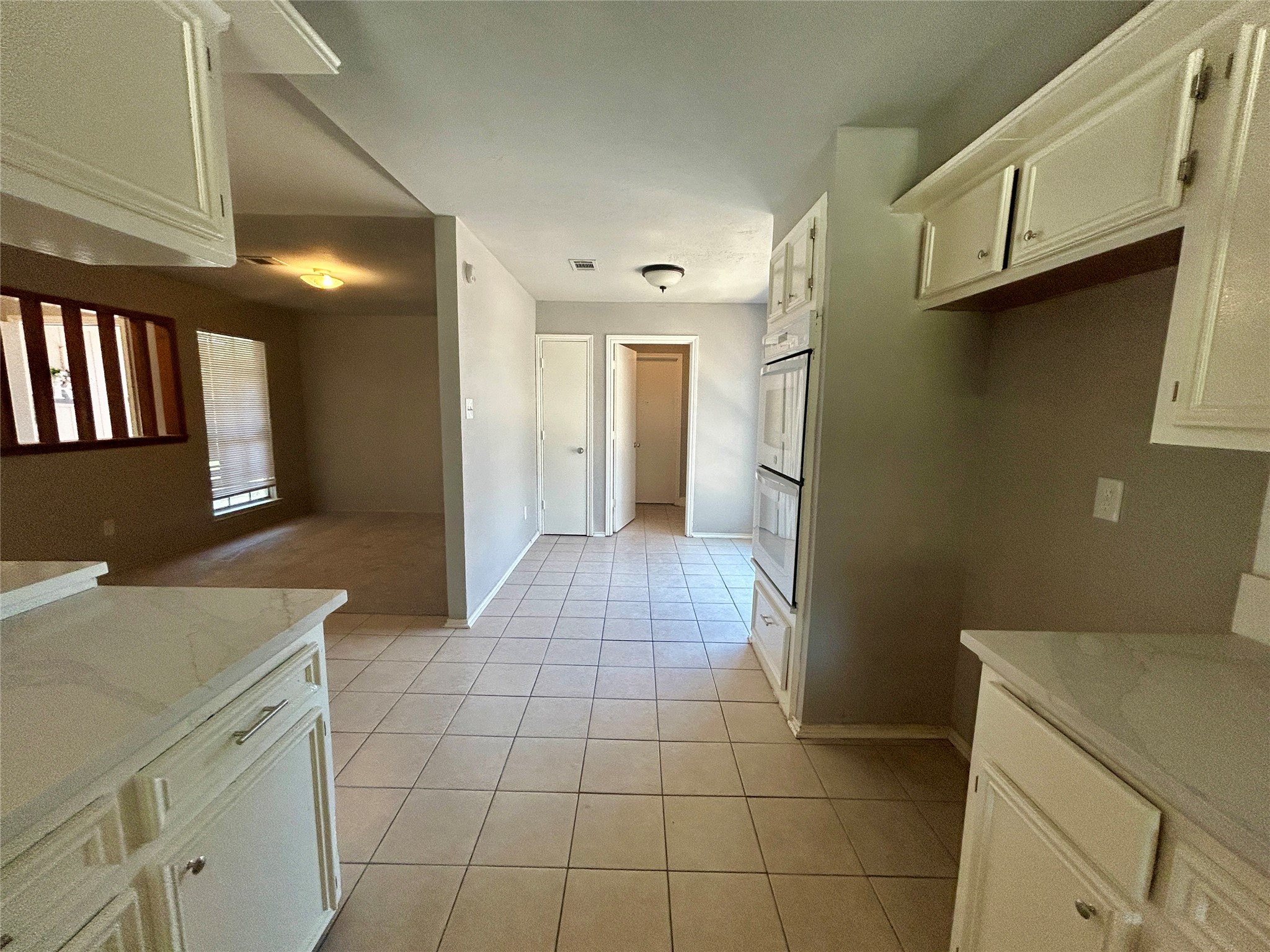 2510 Knollbrook Lane Spring, TX 77373 - Photo 13 of 24 a view of a refrigerator in kitchen and utility room