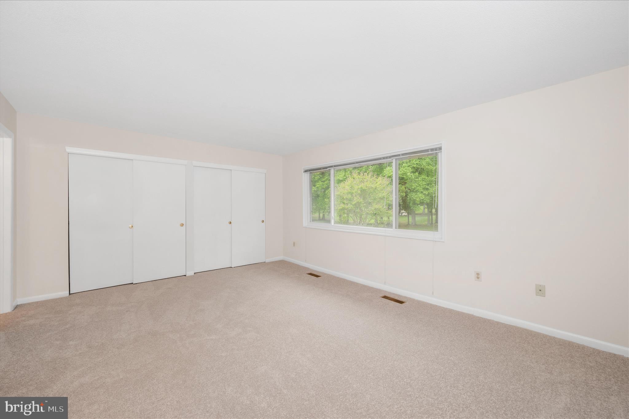 3261 South Leisure World Boulevard, Unit 108F Silver Spring, MD 20906 - Photo 29 of 81 Primary Bedroom