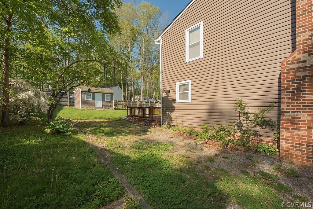 7153 Full Rack Drive Midlothian, VA 23112 - Photo 7 of 23 a view of a house with a yard