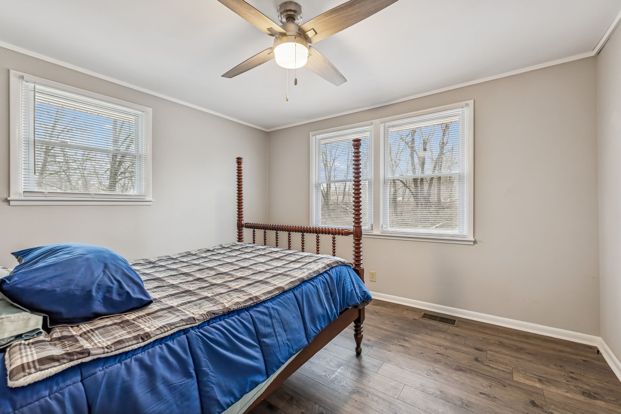 8871 Pinewood Road Lyles, TN 37098 - Photo 15 of 35 a bedroom with a bed and a window