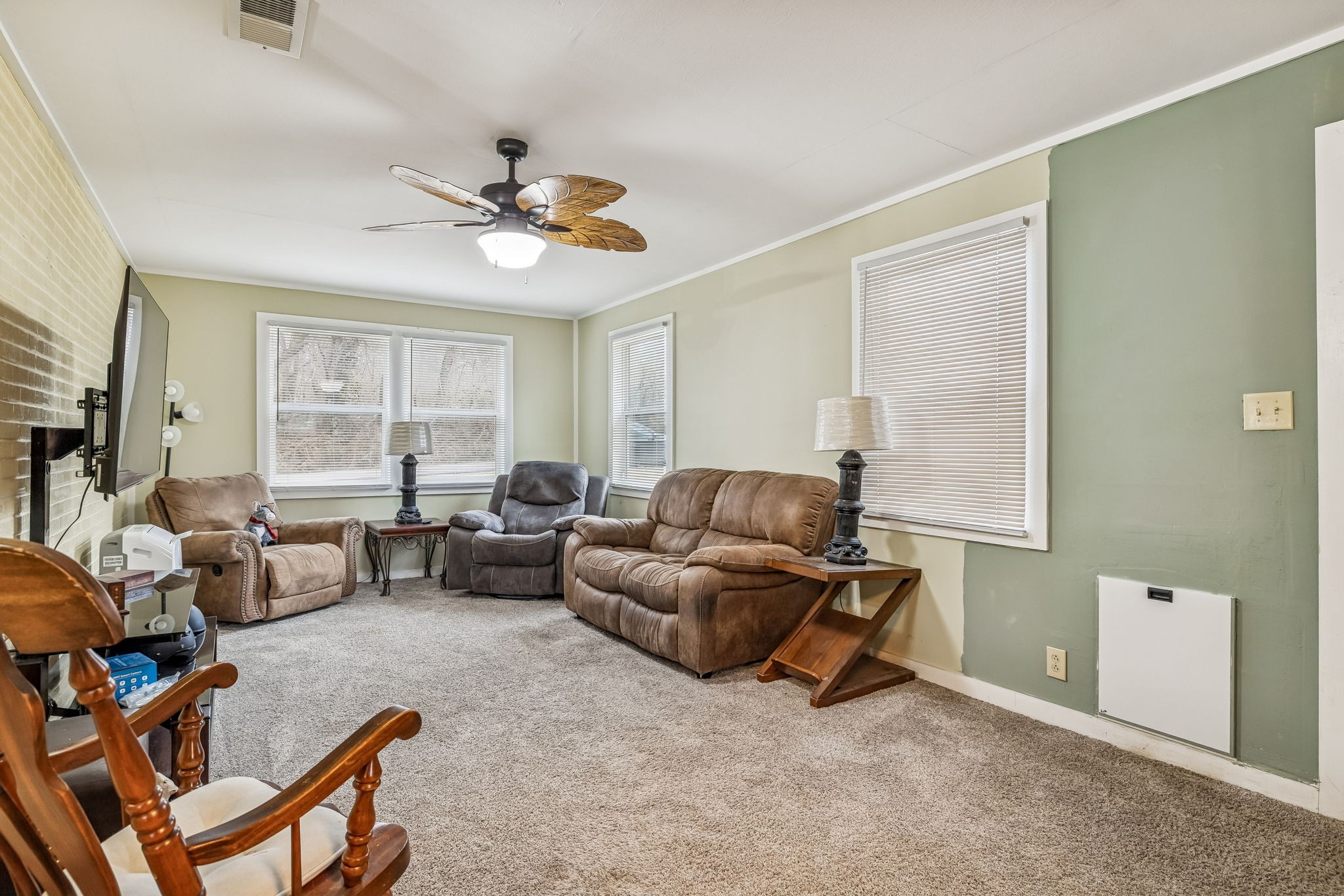 8871 Pinewood Road Lyles, TN 37098 - Photo 22 of 35 a living room with furniture and a large window
