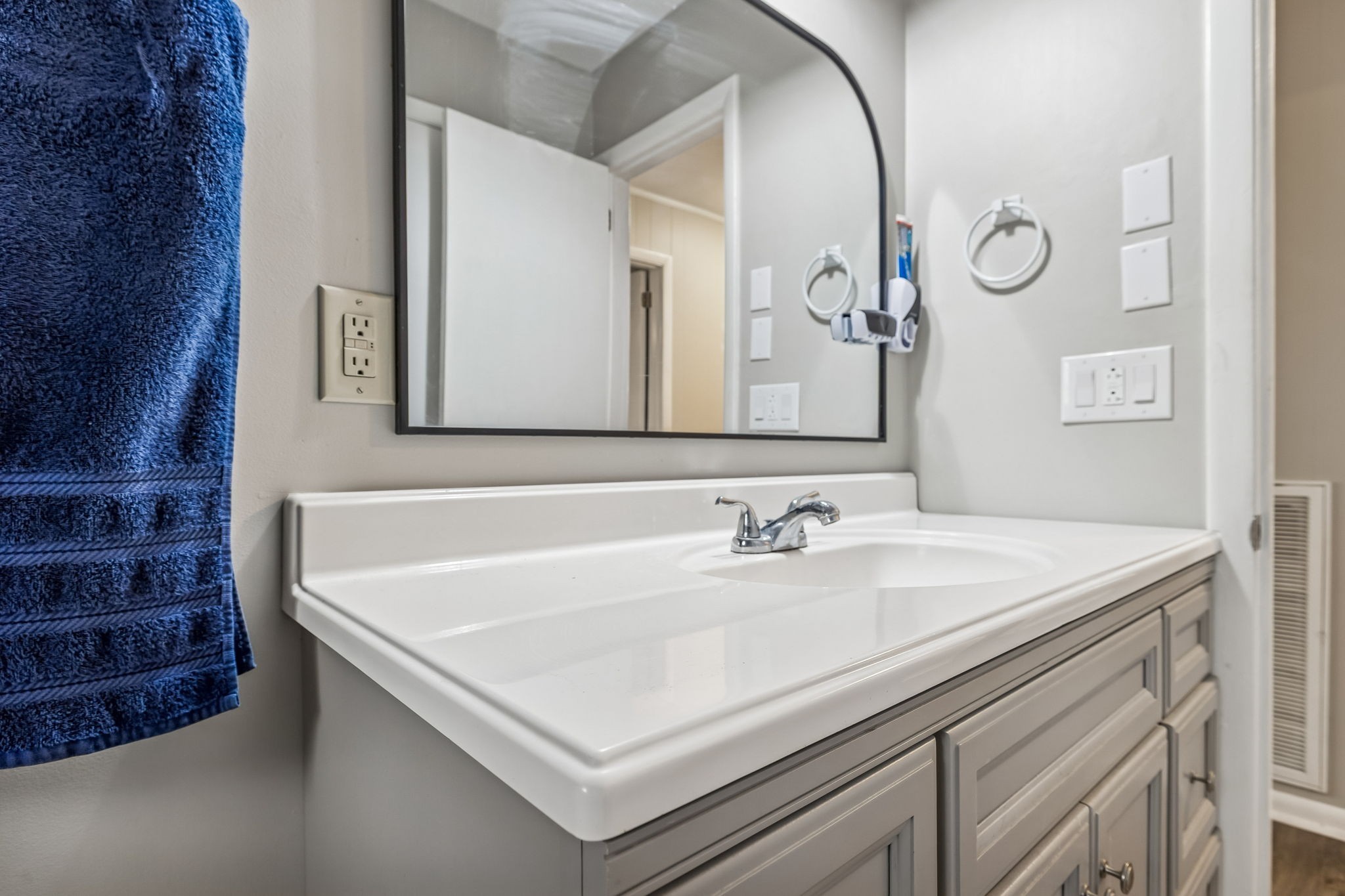 8871 Pinewood Road Lyles, TN 37098 - Photo 24 of 35 a bathroom with a sink and a mirror