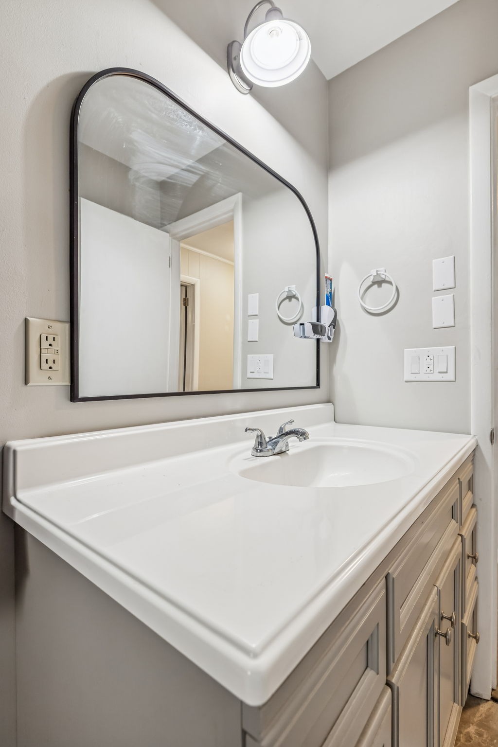8871 Pinewood Road Lyles, TN 37098 - Photo 25 of 35 a bathroom with a sink and a mirror