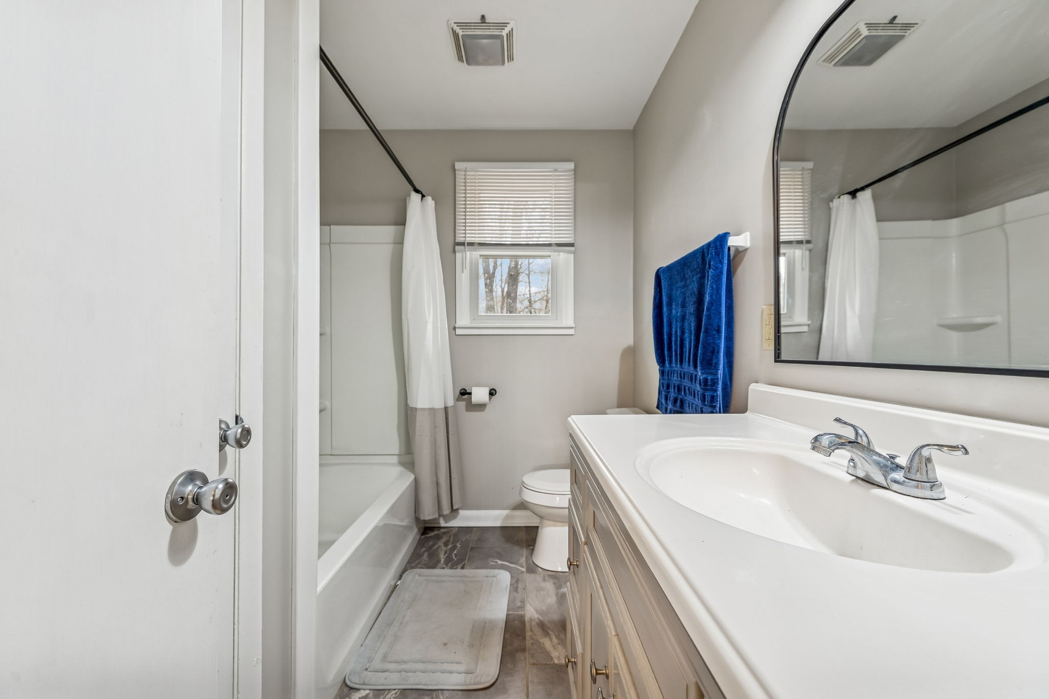 8871 Pinewood Road Lyles, TN 37098 - Photo 26 of 35 a bathroom with a sink and a mirror