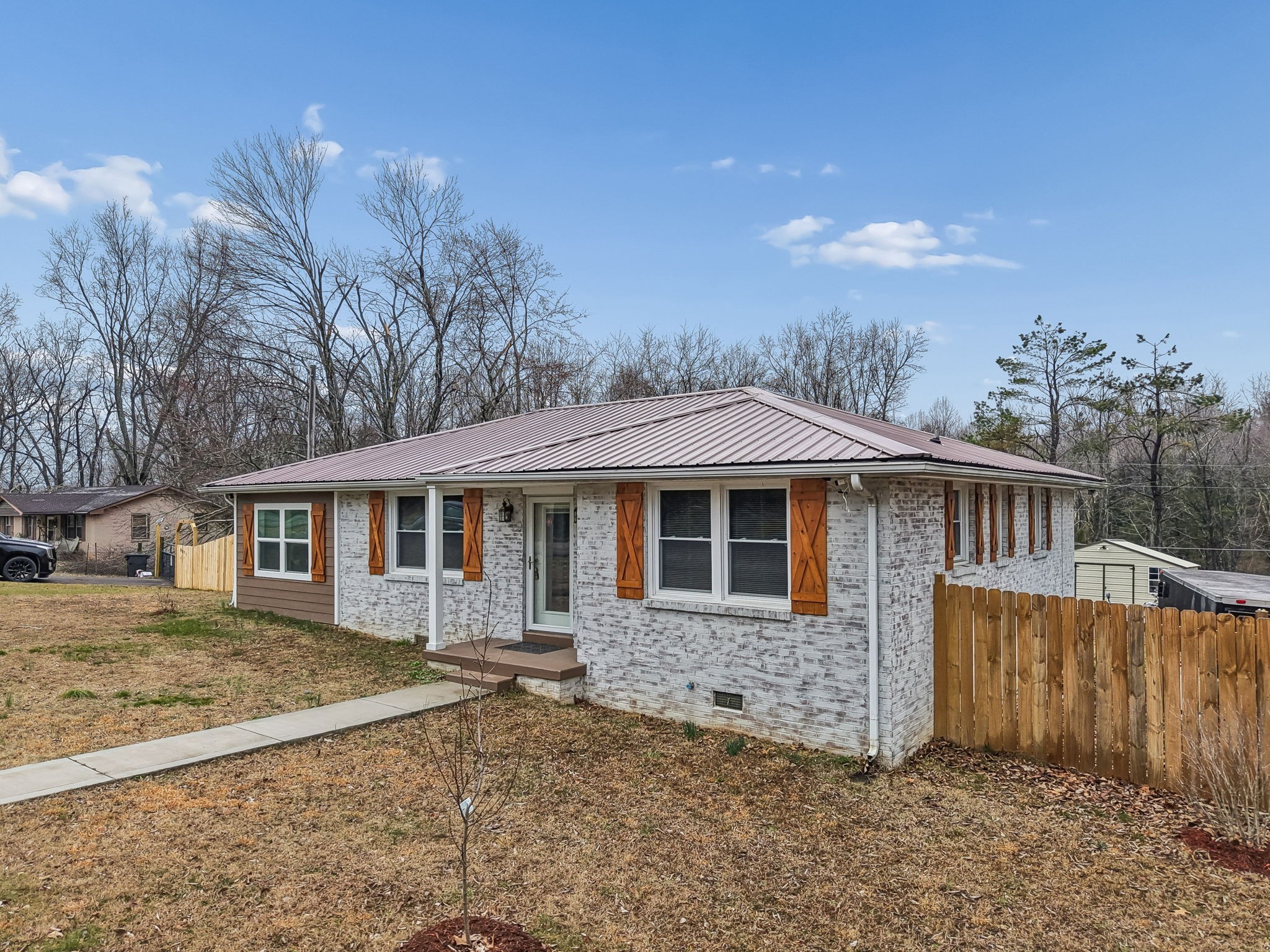 8871 Pinewood Road Lyles, TN 37098 - Photo 3 of 35 a view of a house with a yard