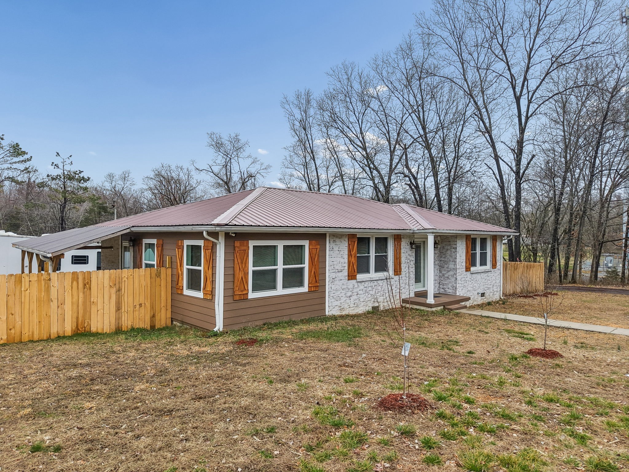 8871 Pinewood Road Lyles, TN 37098 - Photo 4 of 35 front view of a house with a yard