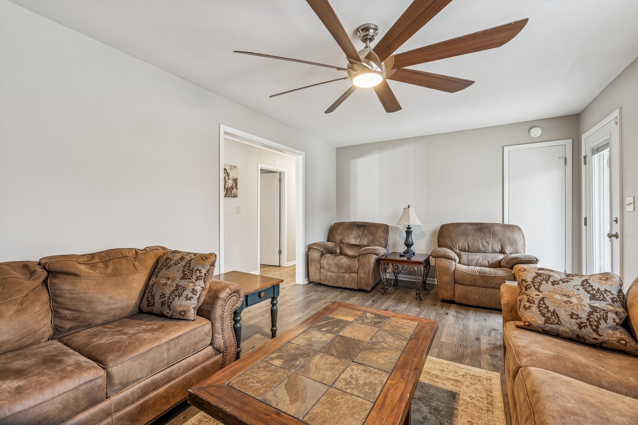 8871 Pinewood Road Lyles, TN 37098 - Photo 8 of 35 a living room with furniture and a couch