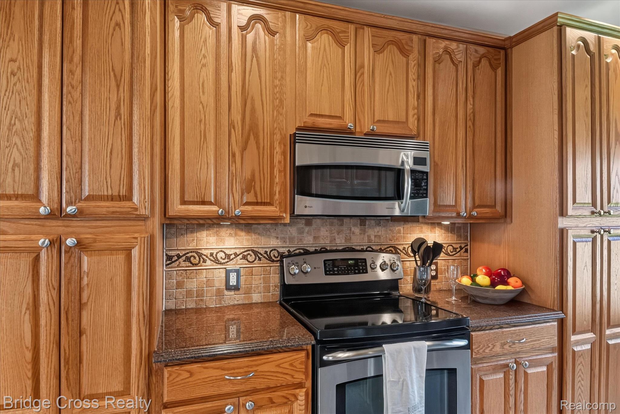285 East Long Lake Road Troy, MI 48085 - Photo 17 of 49 Wood-finish cabinetry and matching built-in pantry