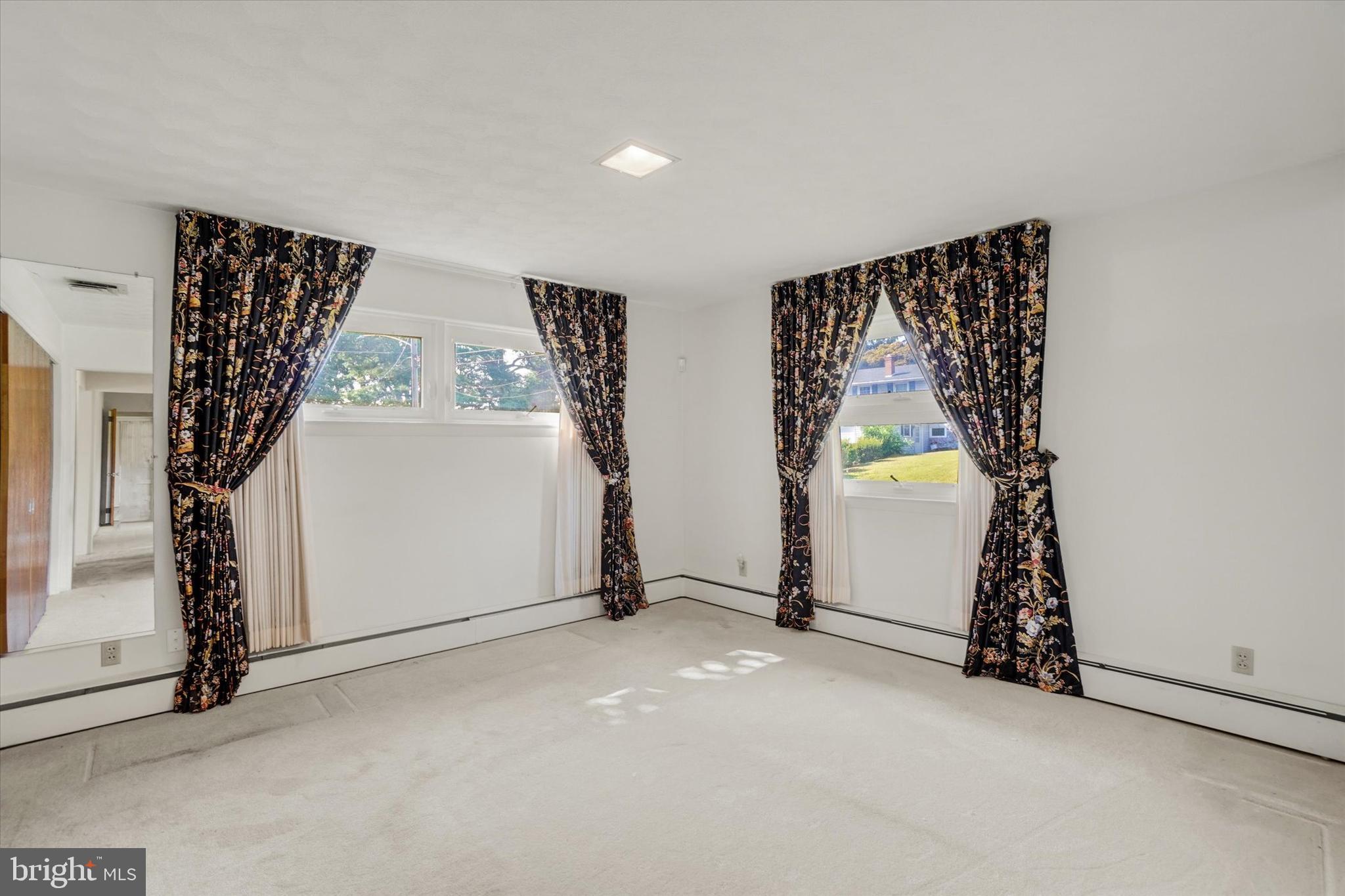 47 Rocks Road Fawn Grove, PA 17321 - Photo 17 of 29 an empty room with windows