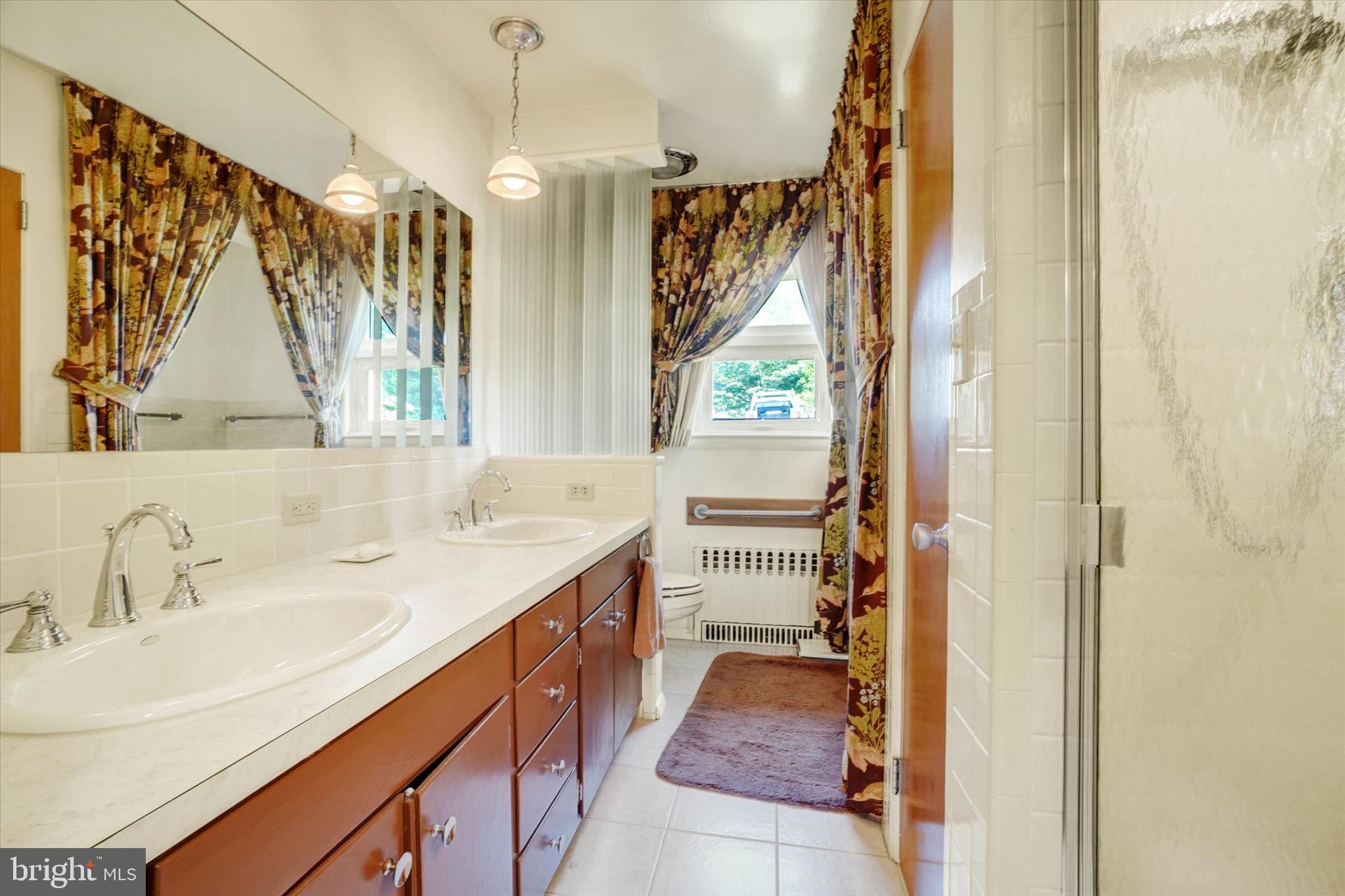 47 Rocks Road Fawn Grove, PA 17321 - Photo 19 of 29 a bathroom with a sink and a mirror