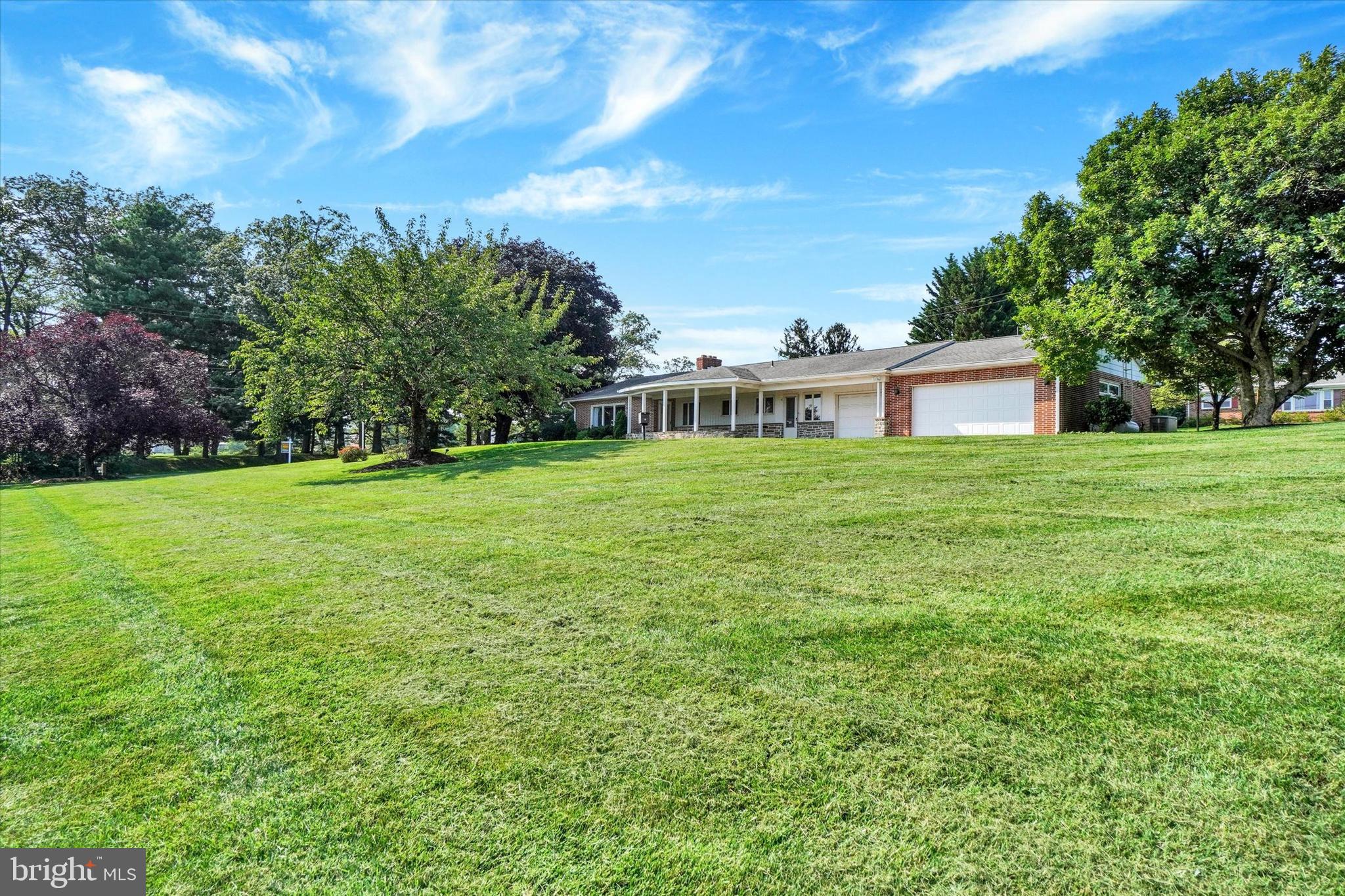 47 Rocks Road Fawn Grove, PA 17321 - Photo 2 of 29 a view of a house with yard and sitting area