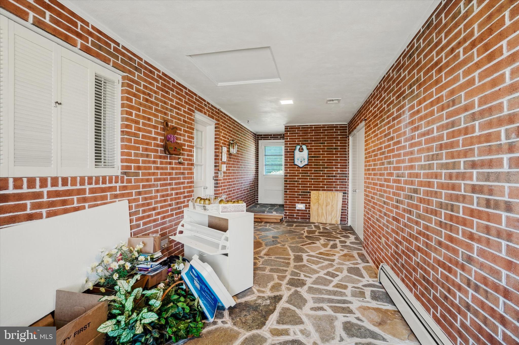 47 Rocks Road Fawn Grove, PA 17321 - Photo 21 of 29 a living room with furniture and a potted plant