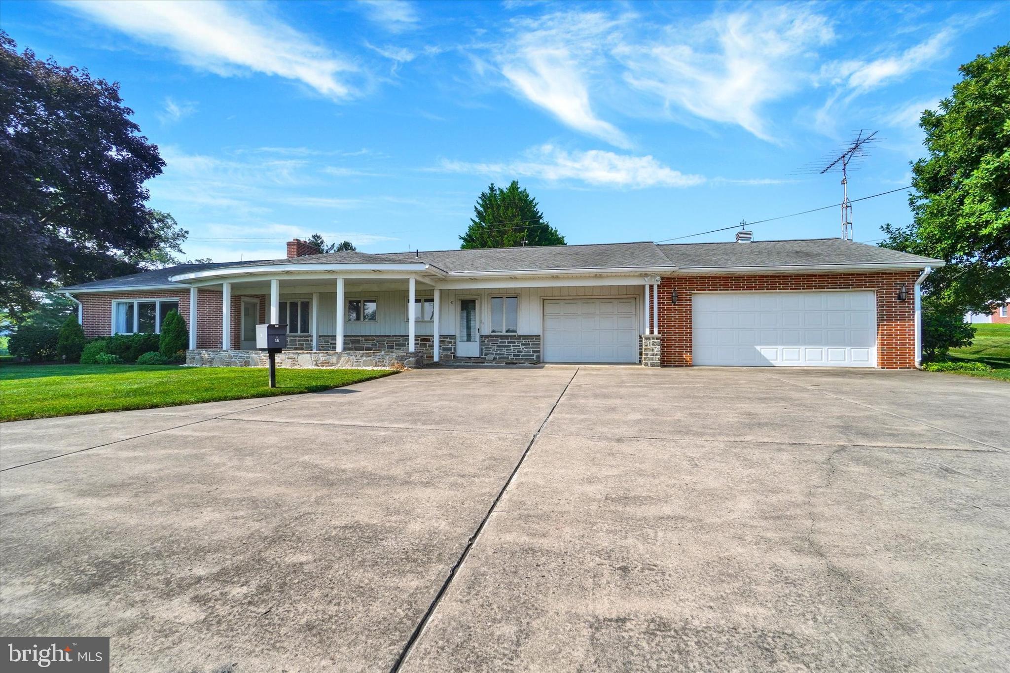 47 Rocks Road Fawn Grove, PA 17321 - Photo 3 of 29 a view of house with a yard and potted plants