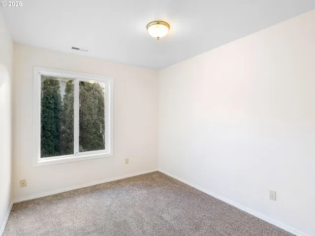an empty room with a window