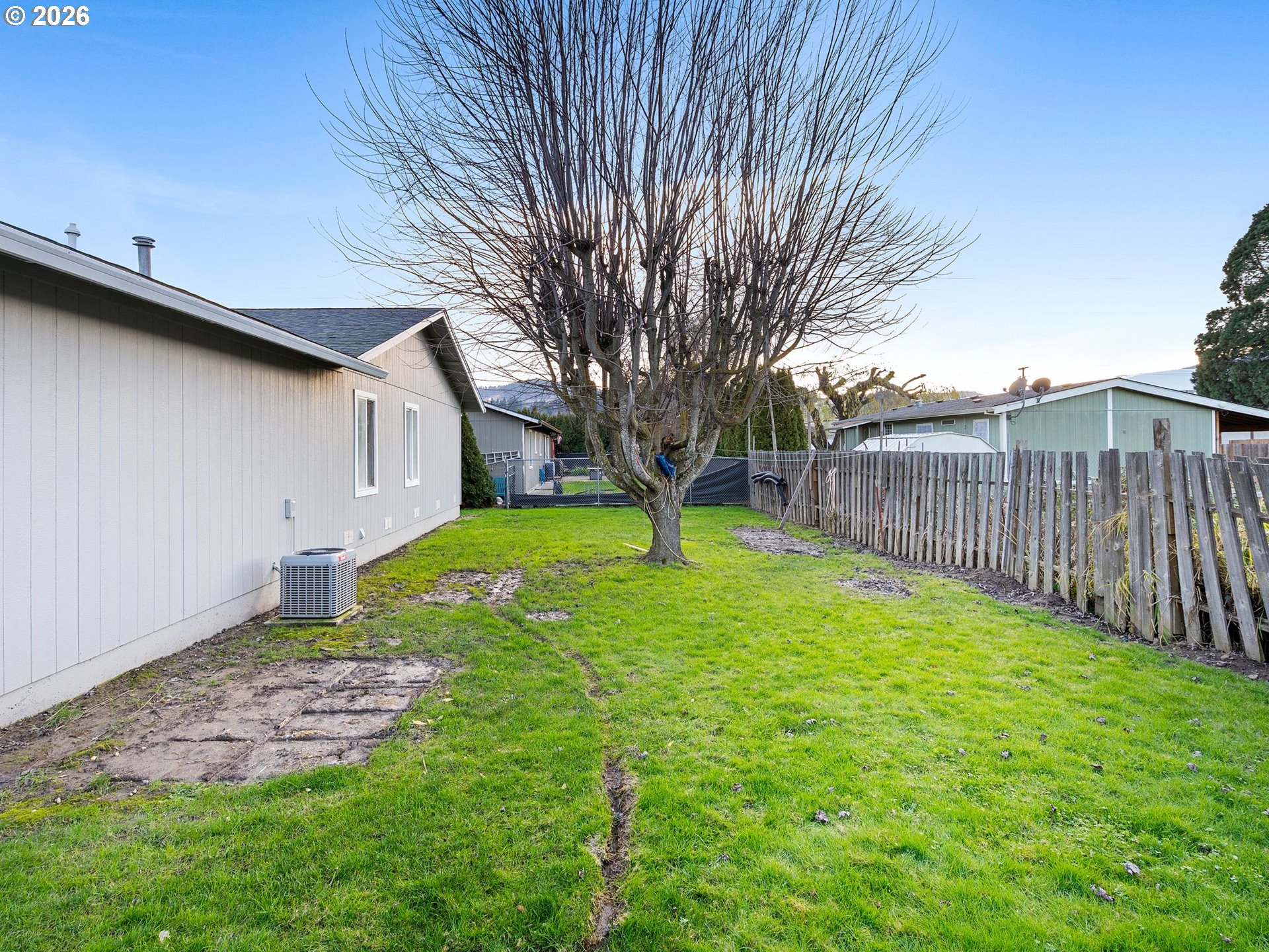 3220 Midway Road Hood River, OR 97031 - Photo 24 of 39 a view of a backyard with a garden
