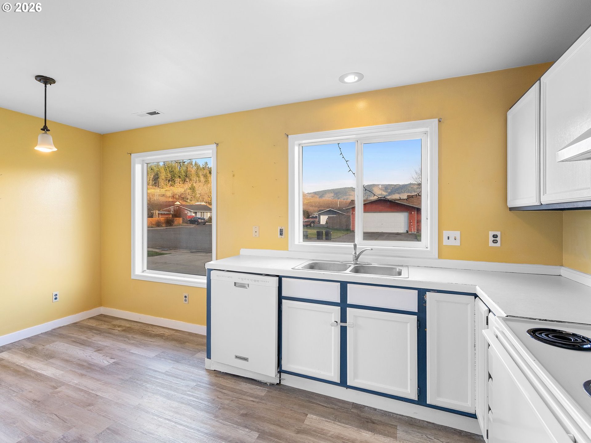 3220 Midway Road Hood River, OR 97031 - Photo 6 of 39 a kitchen with a sink cabinets and wooden floor