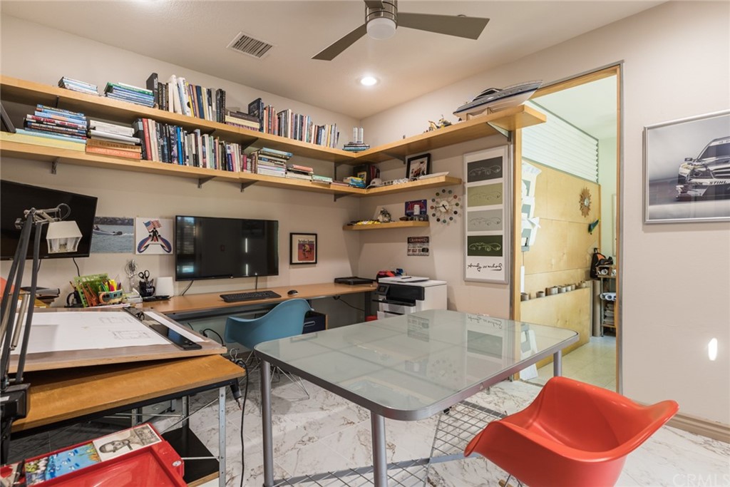 8 Kane Lane Ladera Ranch, CA 92694 - Photo 13 of 29 a living room with furniture a rug and a book shelf
