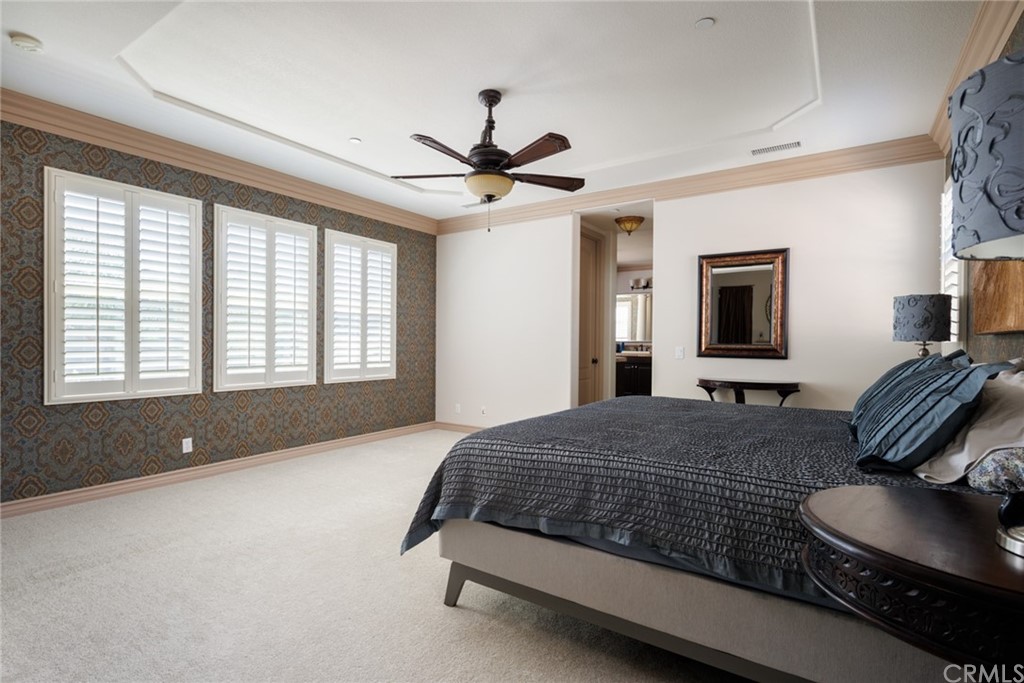 8 Kane Lane Ladera Ranch, CA 92694 - Photo 15 of 29 a bedroom with a bed dresser and a window