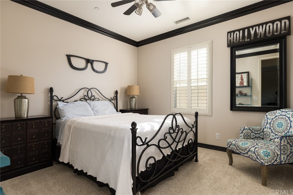 8 Kane Lane Ladera Ranch, CA 92694 - Photo 21 of 29 a bedroom with bed and window