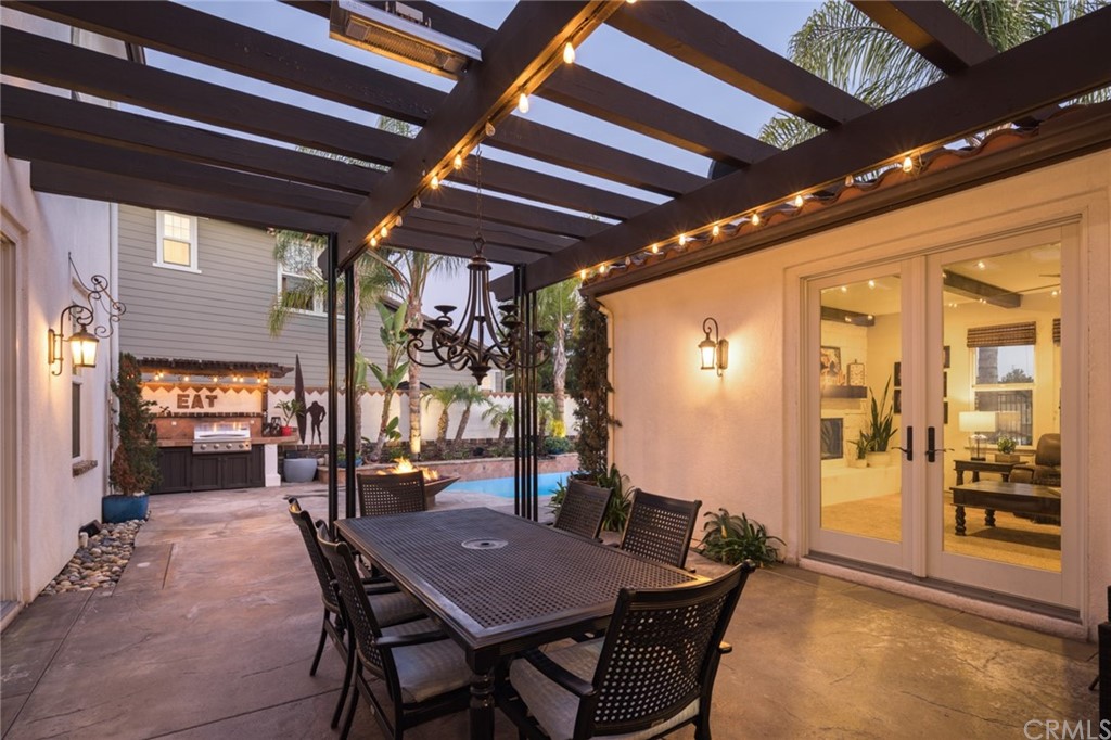 8 Kane Lane Ladera Ranch, CA 92694 - Photo 22 of 29 a dining room with furniture and window