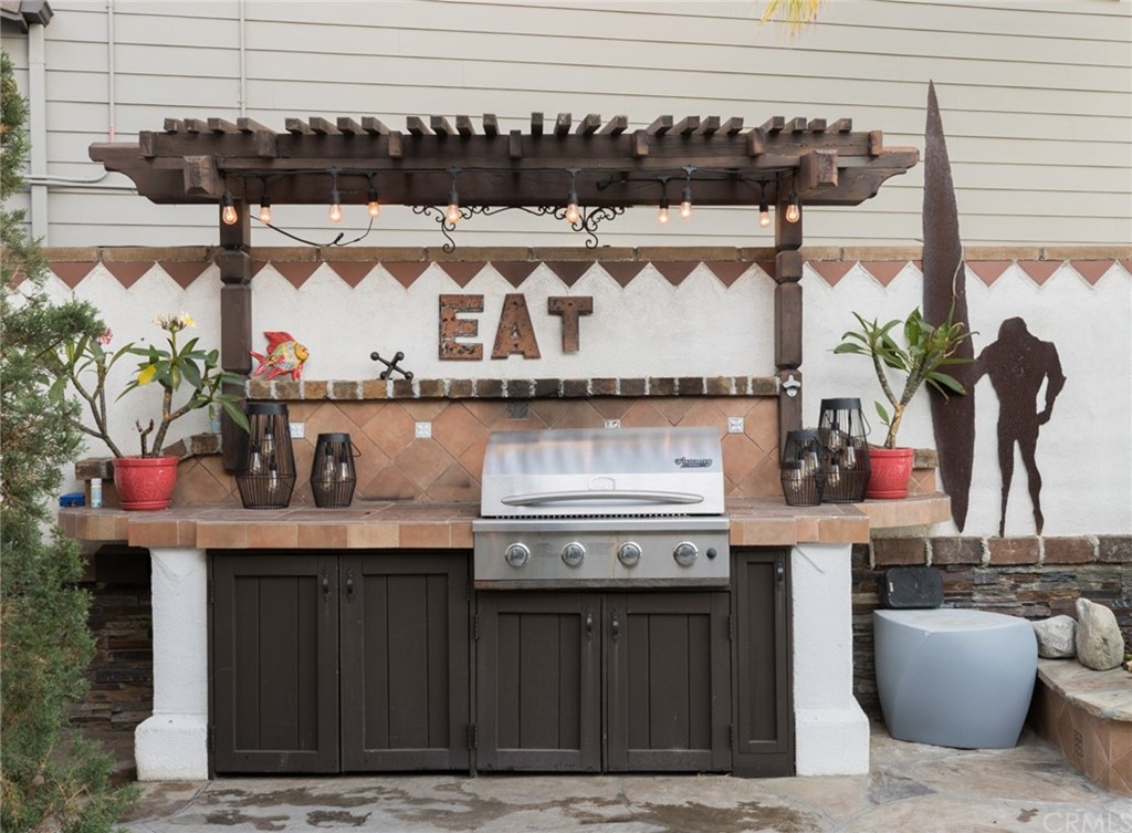8 Kane Lane Ladera Ranch, CA 92694 - Photo 23 of 29 a kitchen with a stove and a white cabinets