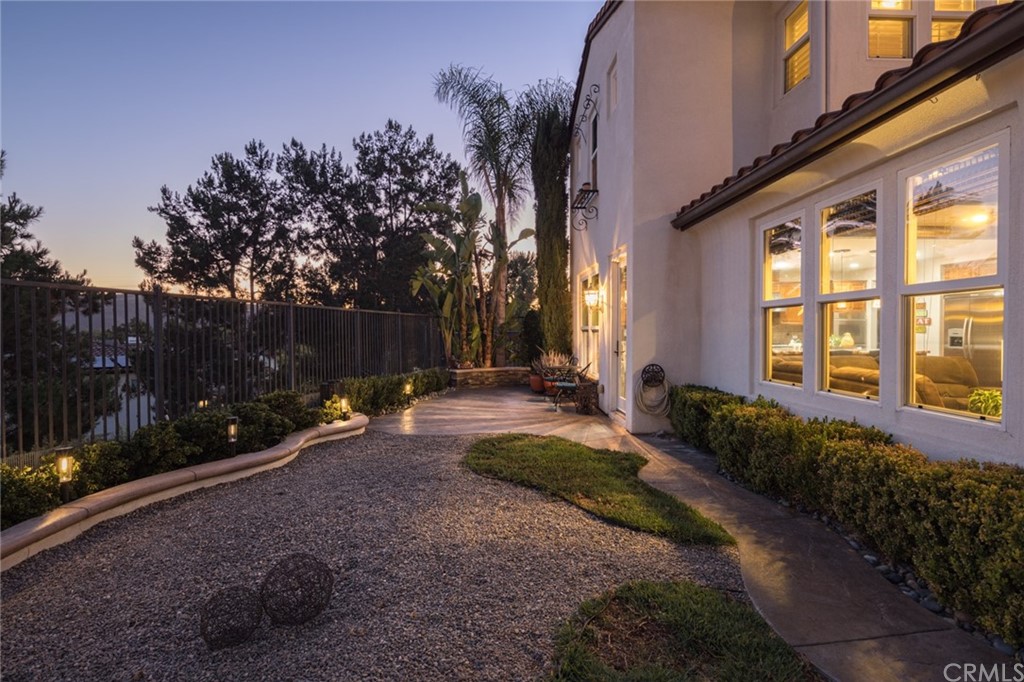8 Kane Lane Ladera Ranch, CA 92694 - Photo 26 of 29 a backyard of a house with yard and outdoor seating
