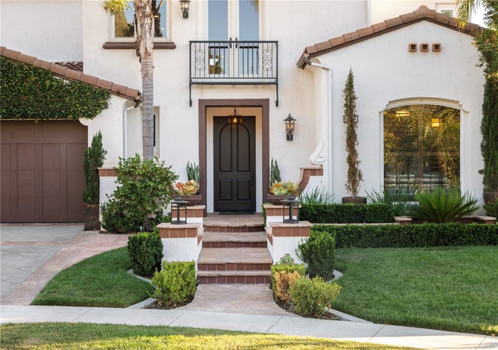8 Kane Lane Ladera Ranch, CA 92694 - Photo 4 of 29 a front view of a house with garden