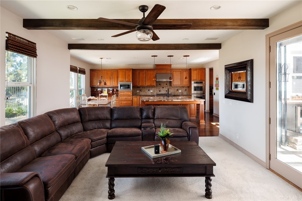 8 Kane Lane Ladera Ranch, CA 92694 - Photo 7 of 29 a living room with furniture and a large window