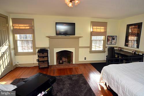 3210 Florence Road Woodbine, MD 21797 - Photo 14 of 30 Third Bedroom w/ Fireplace & Hardwoods