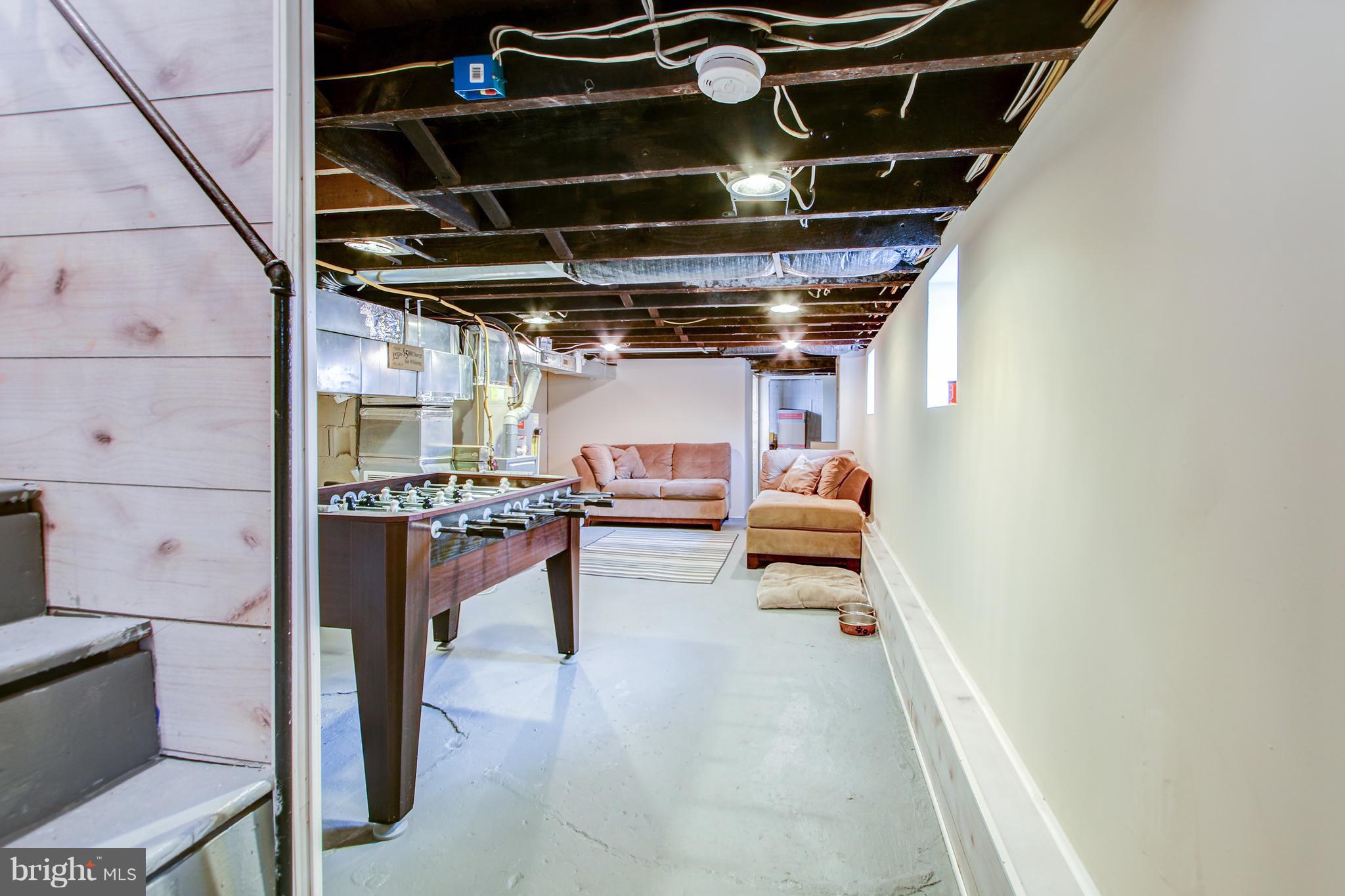 3605 Hineline Road Baltimore, MD 21229 - Photo 26 of 33 Particially finished basement with walkout