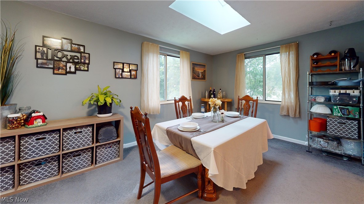 956 Braun Road Belpre, OH 45714 - Photo 23 of 44 DINING ROOM W 4 WINDOWS AND 2 SKYLIGHTS