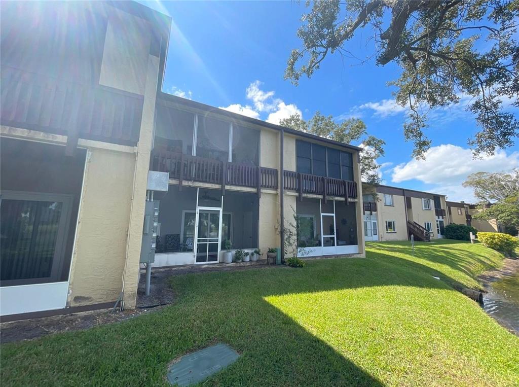 633 North Keene Road, Unit C Clearwater, FL 33755 - Photo 20 of 20 a view of a house with a backyard