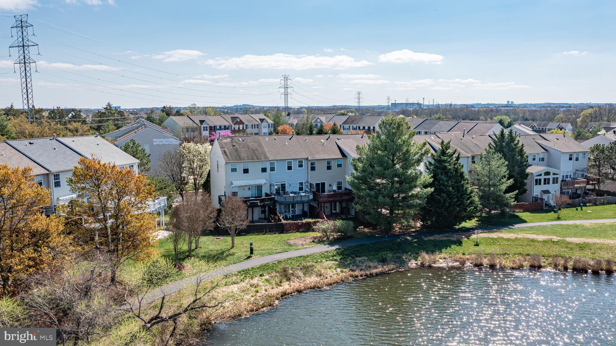 44167 Tippecanoe Terrace Ashburn, VA 20147 - Photo 2 of 56 a view of a lake with houses