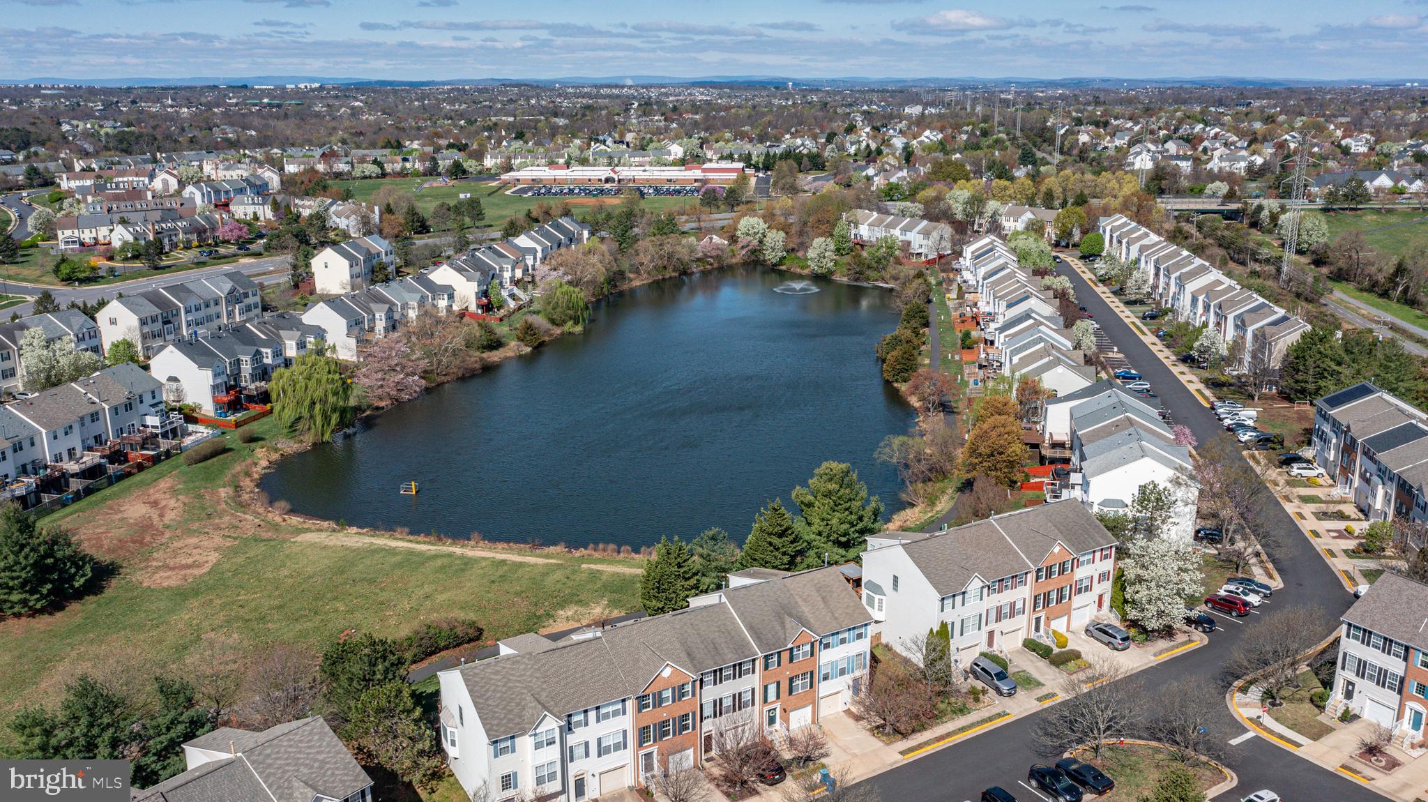 44167 Tippecanoe Terrace Ashburn, VA 20147 - Photo 43 of 56 an aerial view of residential houses with outdoor space