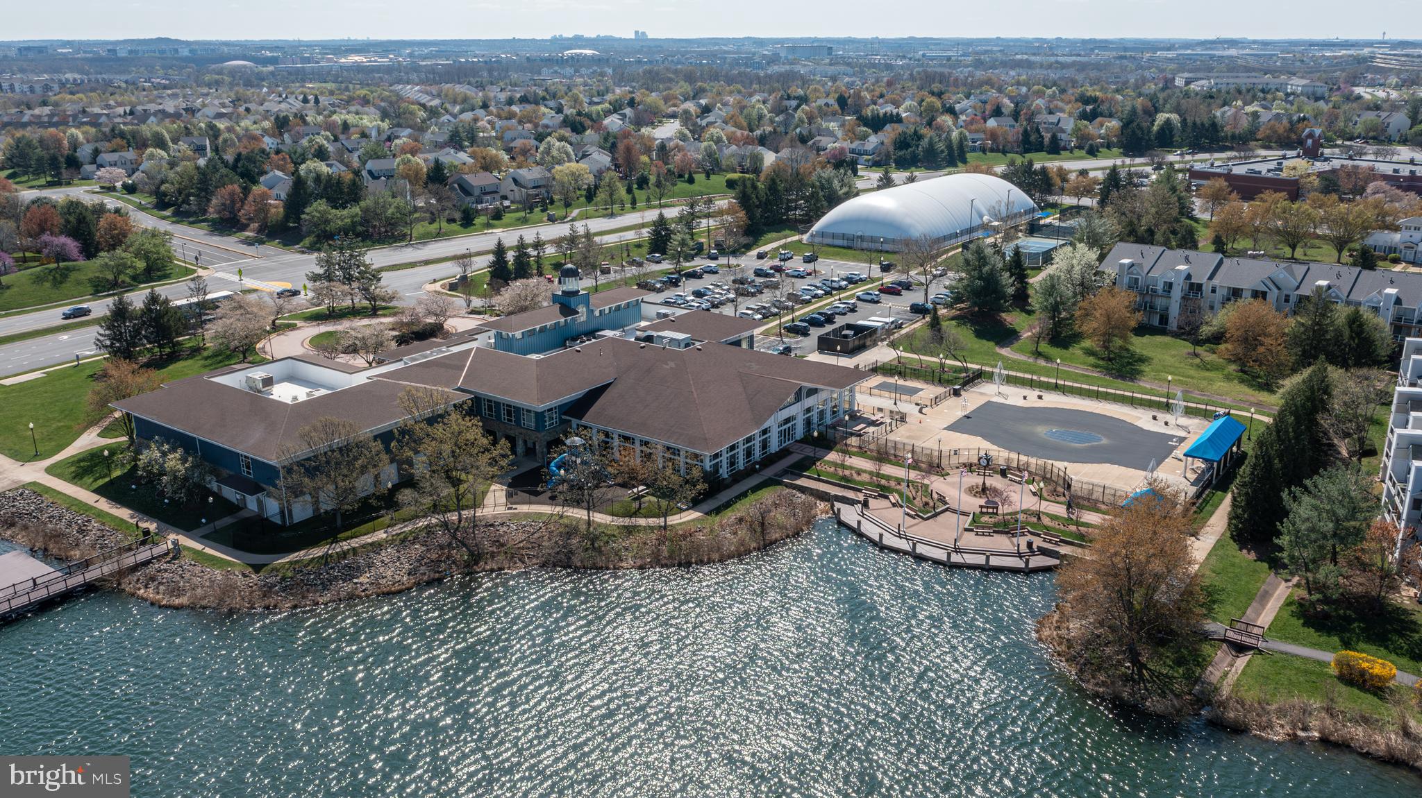 44167 Tippecanoe Terrace Ashburn, VA 20147 - Photo 47 of 56 an aerial view of a house with a garden and lake view