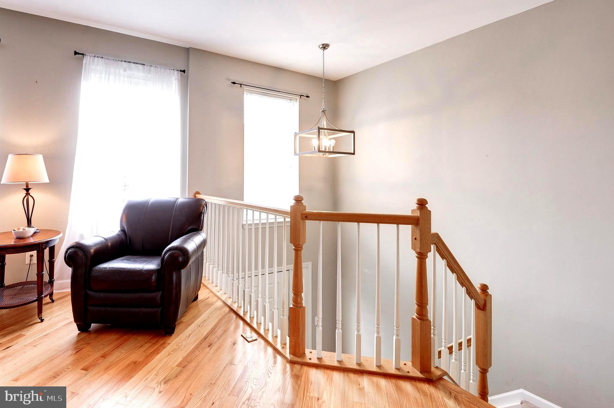 44167 Tippecanoe Terrace Ashburn, VA 20147 - Photo 5 of 56 a living room with furniture and a window