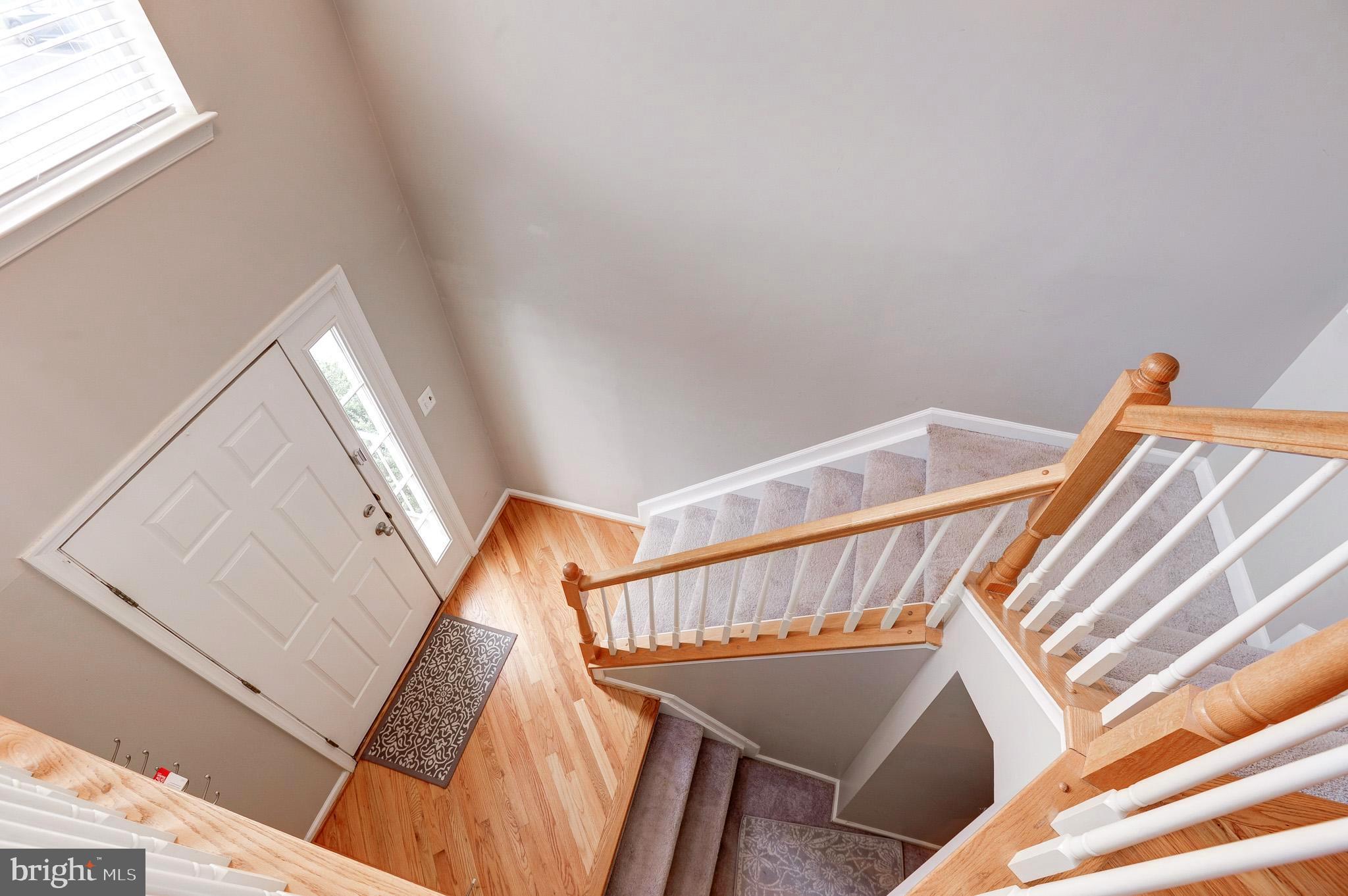 44167 Tippecanoe Terrace Ashburn, VA 20147 - Photo 6 of 56 a view of stairs and with furniture