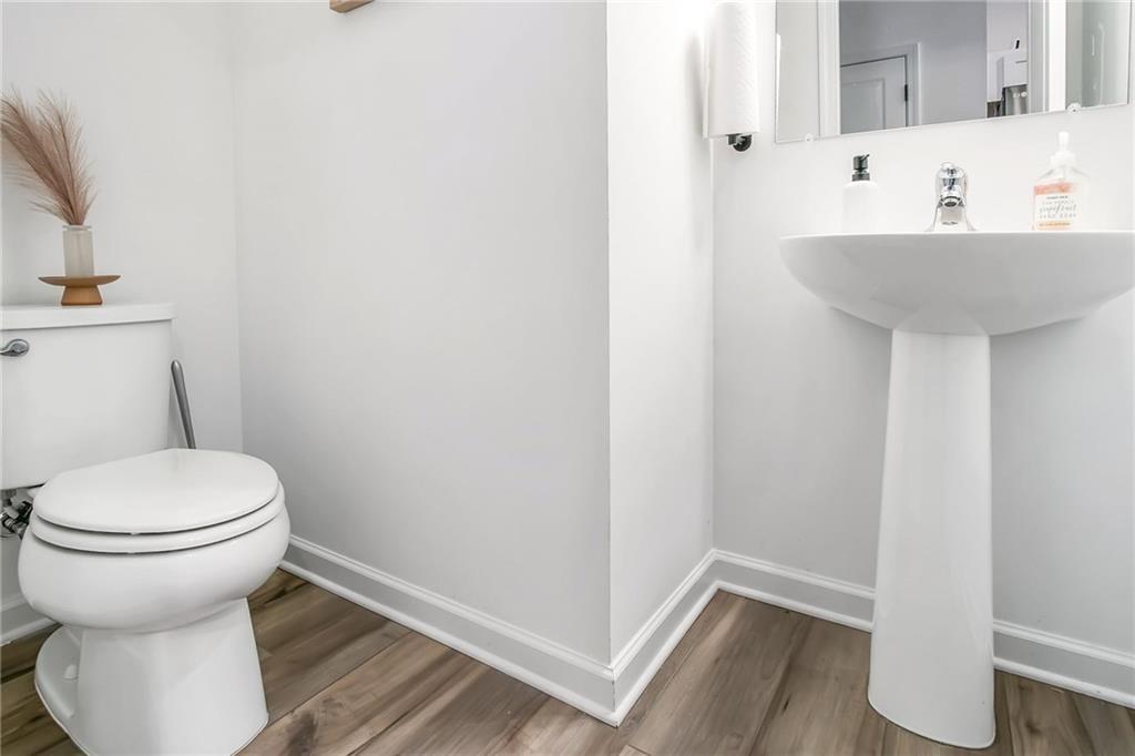 1363 Cooper Springs Road Grayson, GA 30017 - Photo 13 of 28 a bathroom with a sink and a toilet