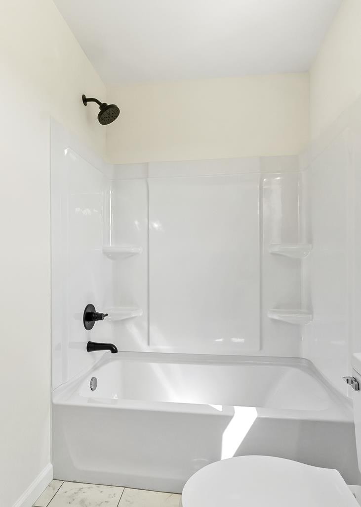 523 Dr I C Morgan Road Spencer, TN 38585 - Photo 14 of 25 a bathroom with a bathtub