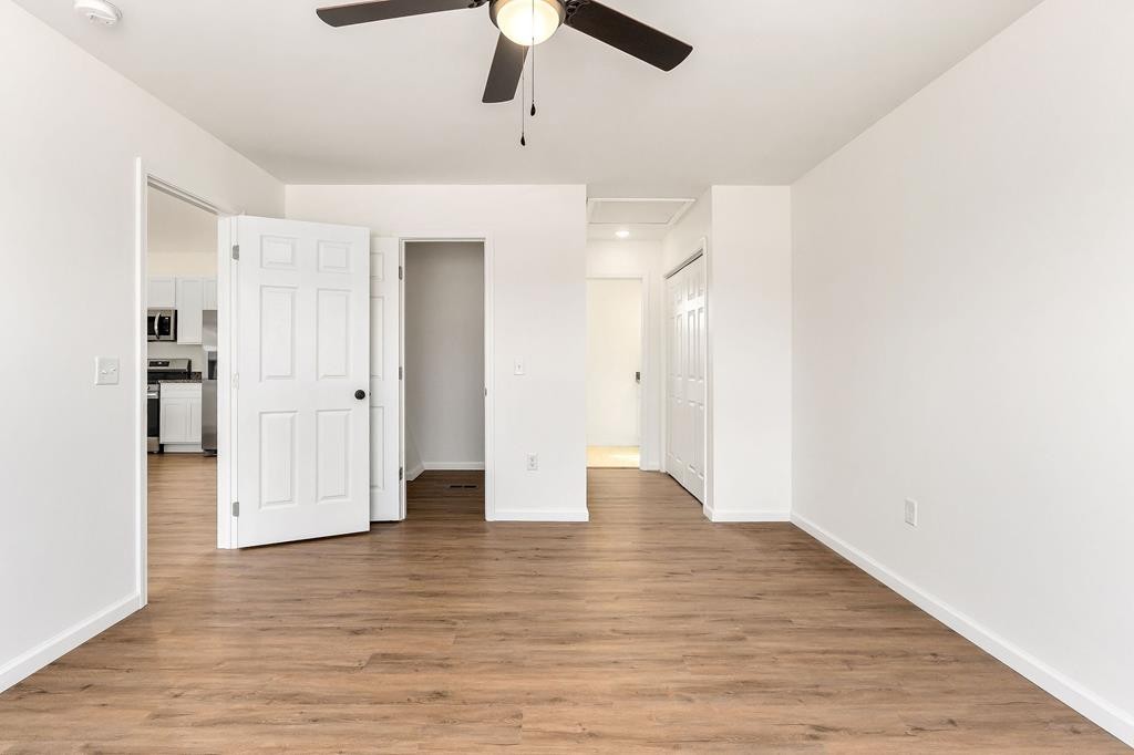 523 Dr I C Morgan Road Spencer, TN 38585 - Photo 17 of 25 a view of an empty room with wooden floor