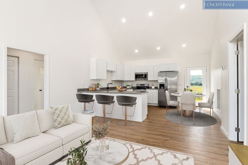 523 Dr I C Morgan Road Spencer, TN 38585 - Photo 2 of 25 a living room with stainless steel appliances furniture white walls and kitchen view